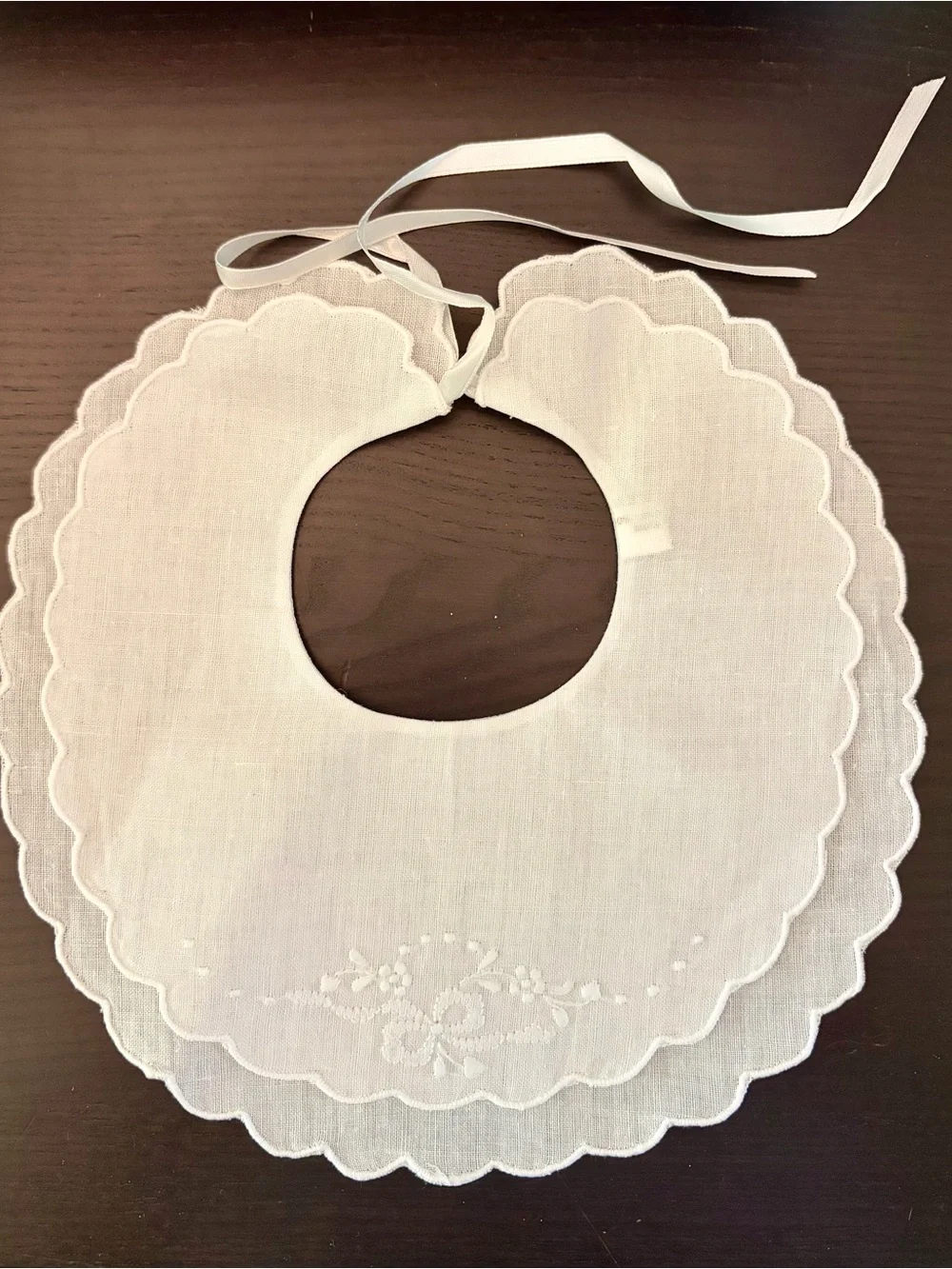 White Scalloped Linen Baby Bib with Embroidered Floral Detail